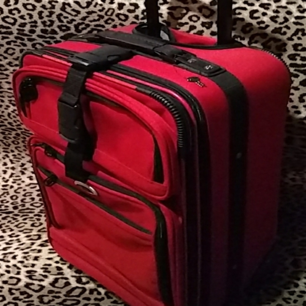 Atlantic Spinner Luggage red suitcase